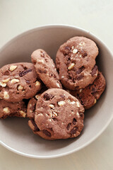 Delicious cookies lies in the cup on the table