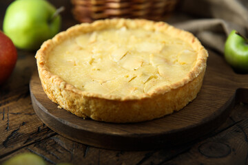 Traditional homemade apple pie with vanilla cream