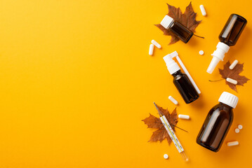 Seasonal diseases concept. Top view photo of spray and syrup transparent brown bottles pills...