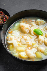 cauliflower soup broth vegetables fresh dish healthy meal food snack diet on the table copy space food background rustic top view keto or paleo diet veggie vegan or vegetarian food