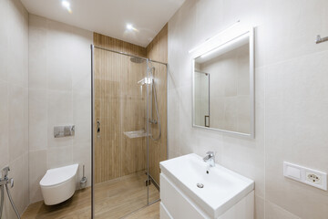 Naklejka na ściany i meble Tile bathroom interior design. Bath and sink for washing