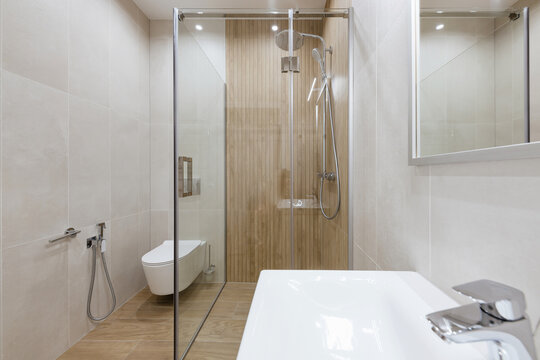 Tile bathroom interior design. Bath and sink for washing
