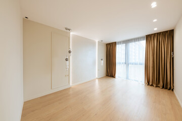 Interior design of a room with light walls and a window. empty and clean
