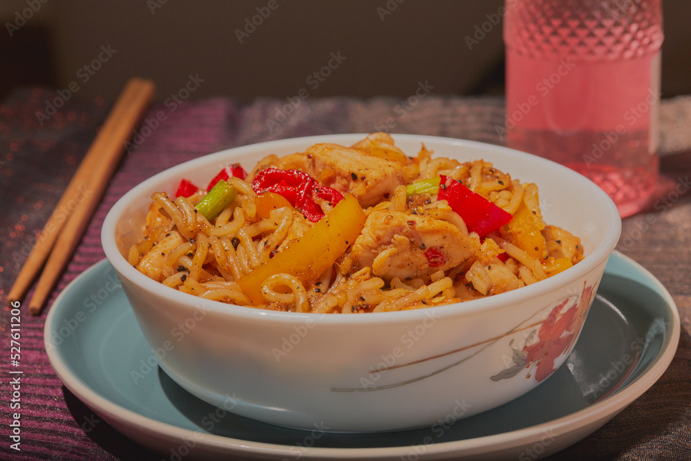 Wall mural chicken stir-fry with noodles and vegetables.