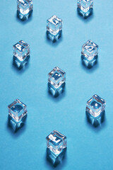 Ice cubes on blue