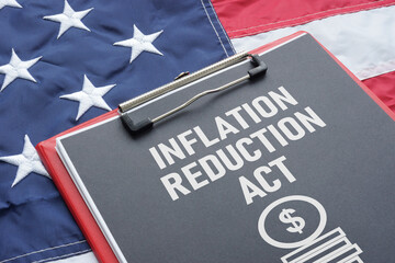 Fototapeta Inflation Reduction Act is shown using the text and the US flag obraz