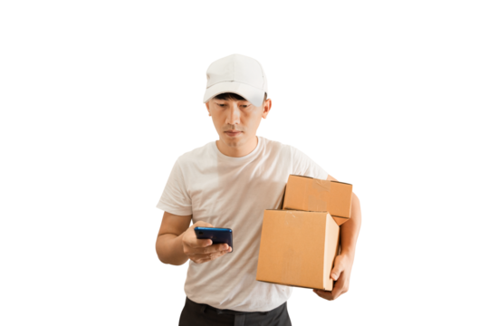 Young Asian delivery man wearing cap with white blank t-shirt holding smartphone and parcel post box on transparent background - PNG format.