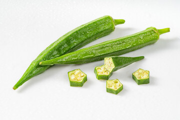 Fresh okra on pure white background