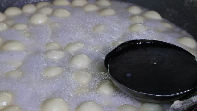 High-angle view of Traditional Sweet Rosogulla making in Bangladesh