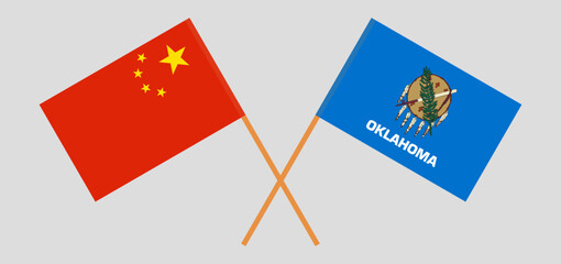 Crossed flags of China and The State of Oklahoma. Official colors. Correct proportion