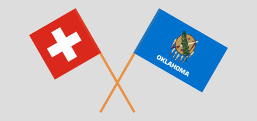 Crossed flags of Switzerland and The State of Oklahoma. Official colors. Correct proportion