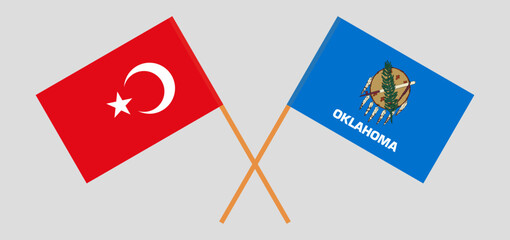 Crossed flags of Turkiye and The State of Oklahoma. Official colors. Correct proportion