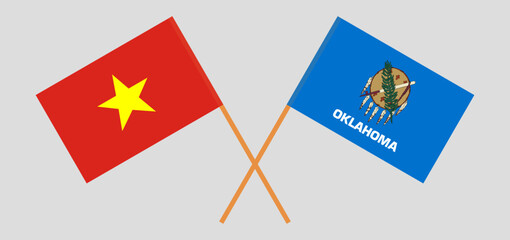 Crossed flags of Vietnam and The State of Oklahoma. Official colors. Correct proportion