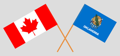 Crossed flags of Canada and The State of Oklahoma. Official colors. Correct proportion