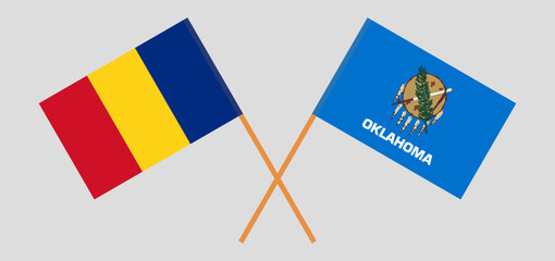 Crossed flags of Romania and The State of Oklahoma. Official colors. Correct proportion