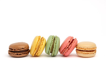 Various colorful macaroons isolated on white background