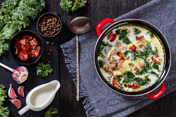 Zuppa Toscana,Tuscan Soup in red pot, top view