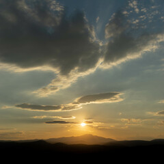 Fototapeta na wymiar Sunset time with beautiful clouds
