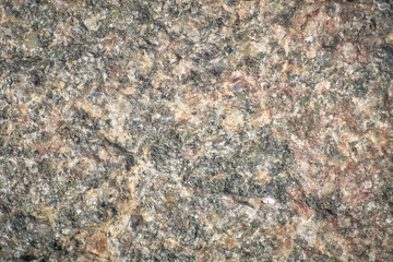 Close-up of the background texture of a chipped stone