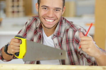 man repairman with hand saw