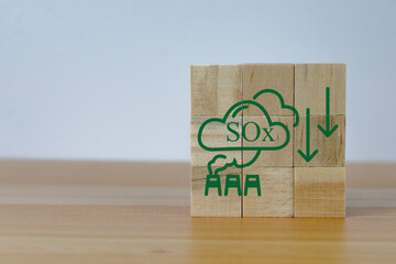 icon on wooden cubes with SOx emission reduction icon for  SOx emission ,green industries business. Net zero emissions. renewable energy, sustainable technology, ecology solutions concept,
