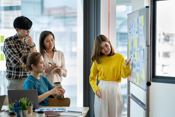 Business team meeting working with new startup project, discussion and analysis data the charts and...