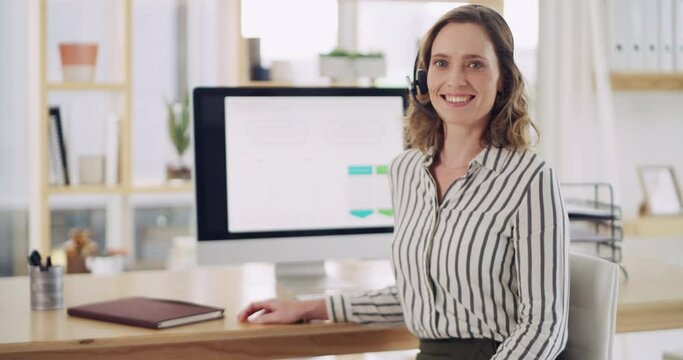 Call center worker working on desktop computer at telemarketing company, in communication with people online and giving support. Portrait of customer service agent in sales and help desk work