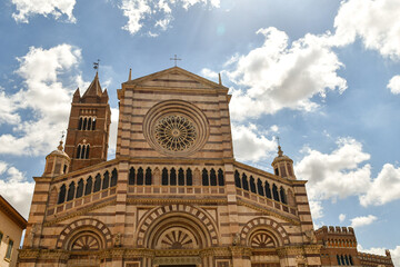 Backlit view of the façade of the medieval Cathedral, with alternate layers of white and red...