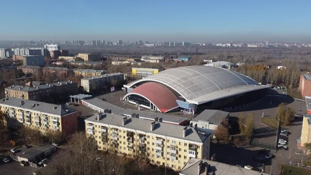 Russia, Krasnoyarsk. 20 November 2021: Sport Stadium Enisey. Home bandy arena Enisey club. Yenisei Ice Stadium, Krasnoyarsk from Drone.