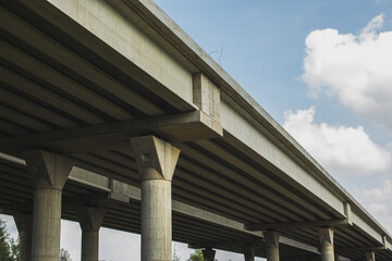 Section of newly constructed elevated highway.Shot against a bright blue sky.