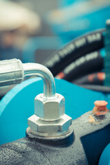 Obraz premium Hydraulic or pneumatic mechanism in industrial machine. Technology