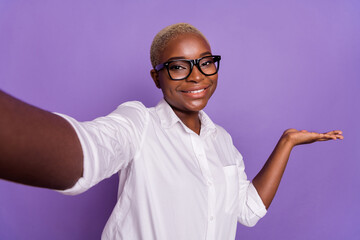 Photo of sweet cute short hair lady wear smart casual look recording self video arm empty space...