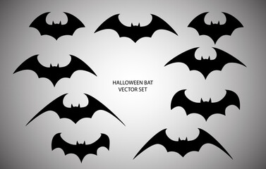 Vector set of different Halloween bats. Halloween flying bats. Vampire vector bat. Dark silhouette of bat flying in a flat style