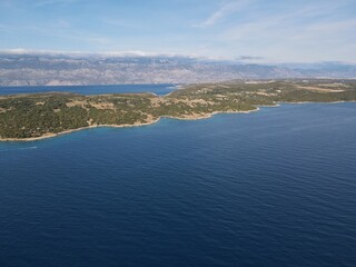 Aerial view of Potocnica, Lun and Novalja in island of Pag, archipelago of Croatia. Panoramic drone view of waterfront, idyllic and turquoise sea in Novalja, Adriatic Sea in Dalmatia region.
