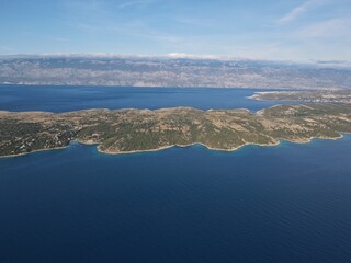 Aerial view of Potocnica, Lun and Novalja in island of Pag, archipelago of Croatia. Panoramic drone view of waterfront, idyllic and turquoise sea in Novalja, Adriatic Sea in Dalmatia region.
