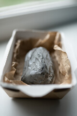 Cake in the form of a stone