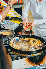 Fried tacos stuffed with chicken, potatoes and green mole, typical Mexican food, mainly consumed during the national holidays in Mexico.
