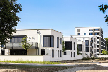 Exterior Modern Buildings with Shutters Windows. Modern Residential Apartments Buildings block - White and Black.