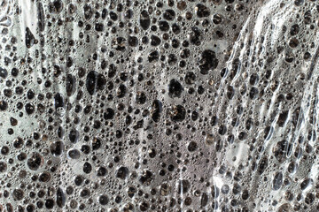 Evaporation in a greenhouse. Water drops on a polyethylene pellicle.
