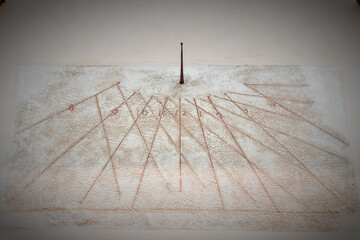 Sundial on a Florence building facade