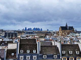 Panorama of Paris roofs with La Defense on background, France