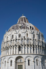 Pisa, Tuscany, Italy 08-28-2022. Details the architecture of the Pisa Baptistery, dedicated to Saint John the Baptist, faces the cathedral at the western end of the Piazza dei Miracoli.