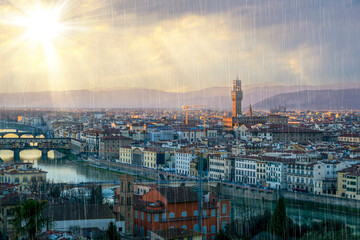 Florence city view rain clouds and sun beams on sky famous architecture of touristic destination 