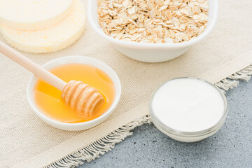 Making face mask at home with natural ingredients - herbal honey, greek yogurt and oatmeal. Natural skin care and beauty treatment. Zero waste handmade cosmetics