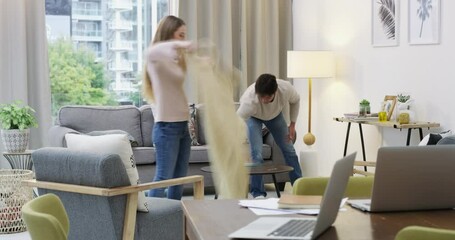 Couple spring cleaning living room, teamwork speedy organized home and dust furniture. Family love working together, do laundry on lounge sofa, floor cleaner and modern gender equality in housework