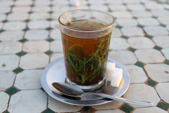 Cup of maghrebi mint tea, also known as Moroccan mint tea
