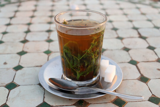 Cup of maghrebi mint tea, also known as Moroccan mint tea