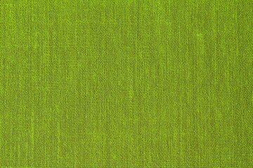 Abstract design background of lattice cell green coarse-grained intersection texture of rough fabric with an interlacing. Linen christmas sack textile canvas burlap cloth. Close-up, mock up, top view