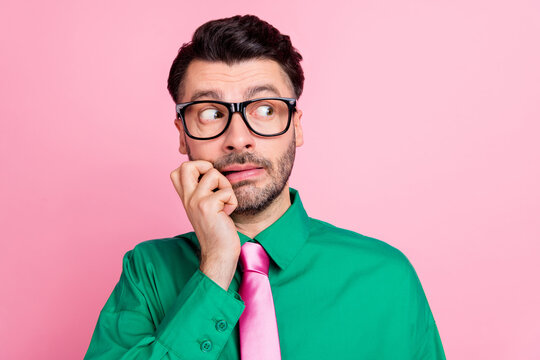 Closeup photo of young smiling funny guy hold eyeglasses looking you happy grimace toothy isolated on pink color background