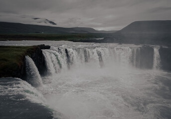 Icelandic waterfall in the mountains